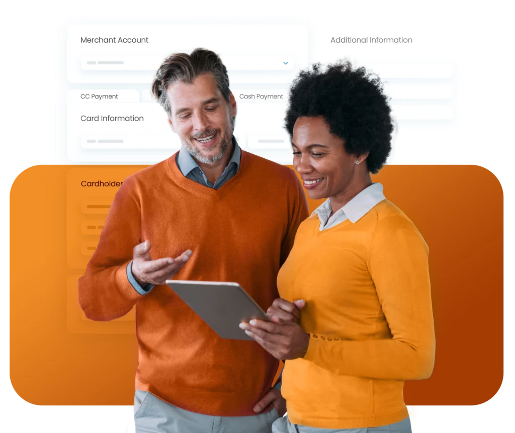 A photo of a man and a woman working on a tablet computer.