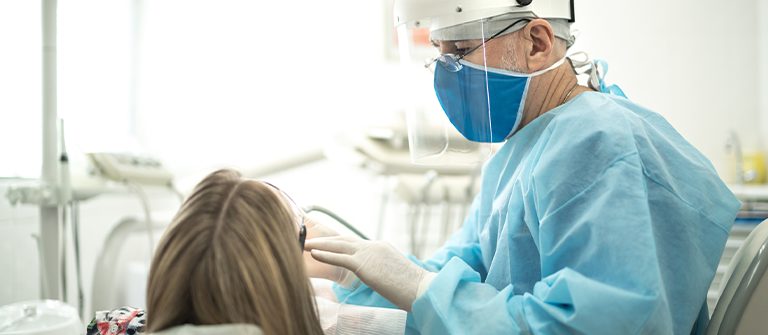 Dentist providing treatment