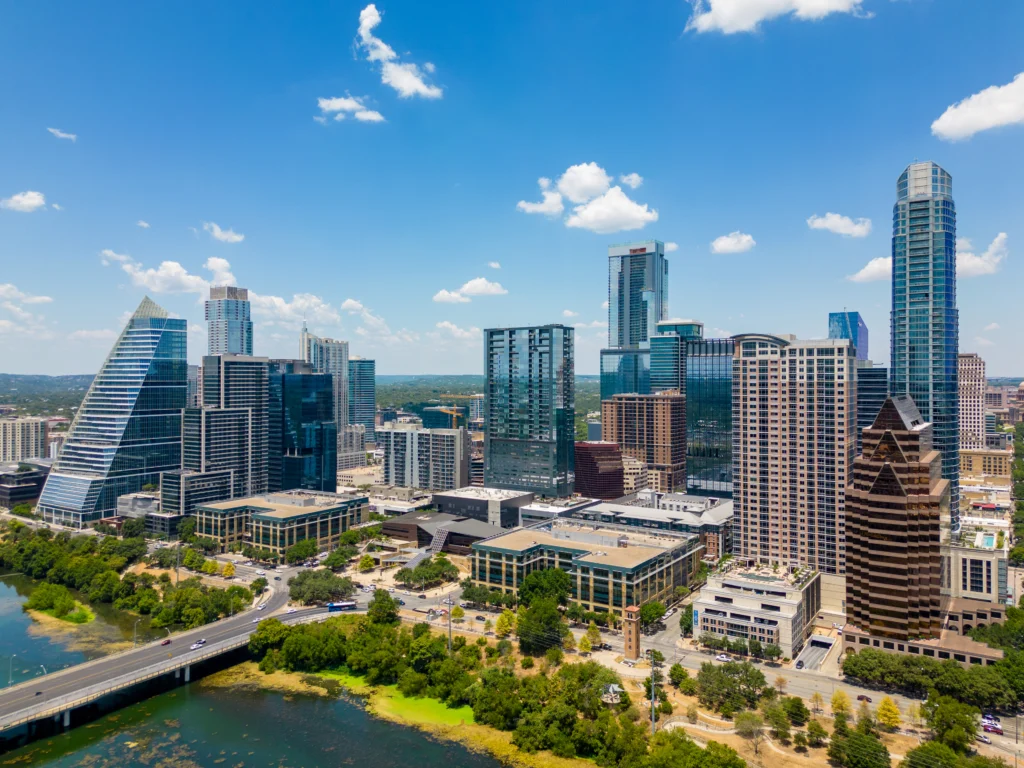 An aerial photo of modern buildings on the waterfront of Austin, Texas.