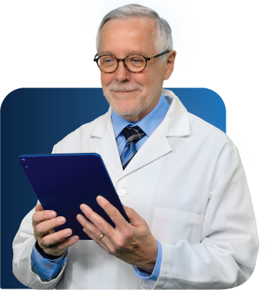 A photo of a male doctor using a tablet computer.